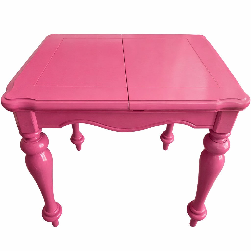 Meet Chloe - an expertly hand finished high gloss Peony Pink parlor table (accent table) with hidden storage